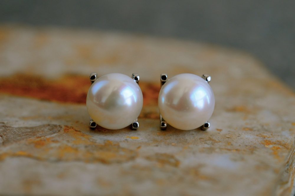 9.5mm white pearl studs, solid sterling silver 4 prong setting, very unique white pearl earring studs