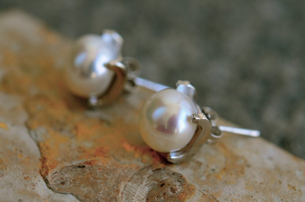 9.5mm white pearl studs, solid sterling silver 4 prong setting, very unique white pearl earring studs