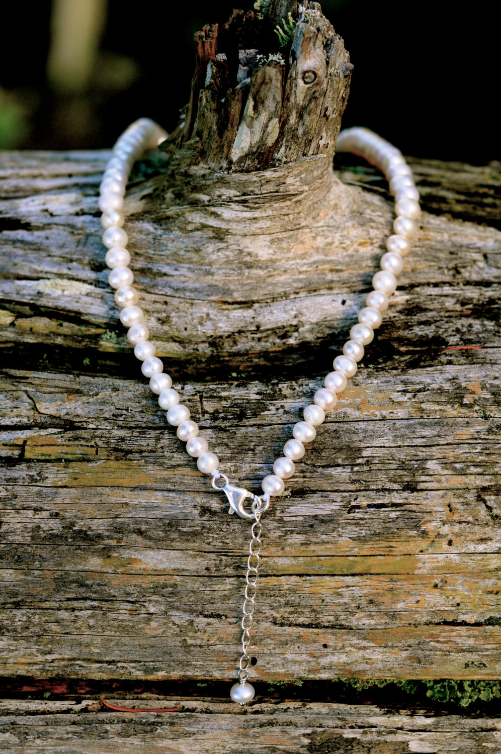 a classic white pearl necklace, retro graduated white pearl necklace, a timeless piece